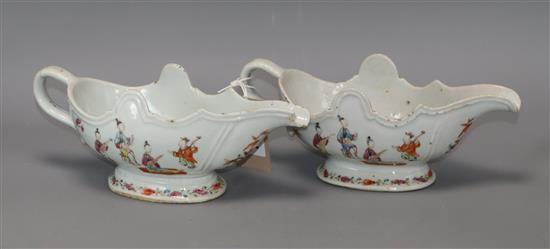 A pair of Chinese Qianlong period famille rose sauceboats length 24cm
